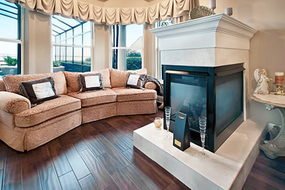 Elegant Estate Kissimmee master bedroom sitting room lake view fireplace