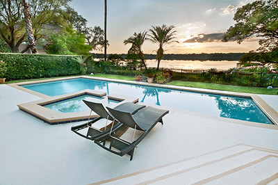Elegant Estate Isleworth patio pool lake view sunset