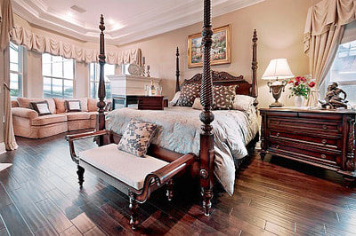 Luxury Estate Kissimmee Elegant Bedroom with Sitting Area and Fireplace